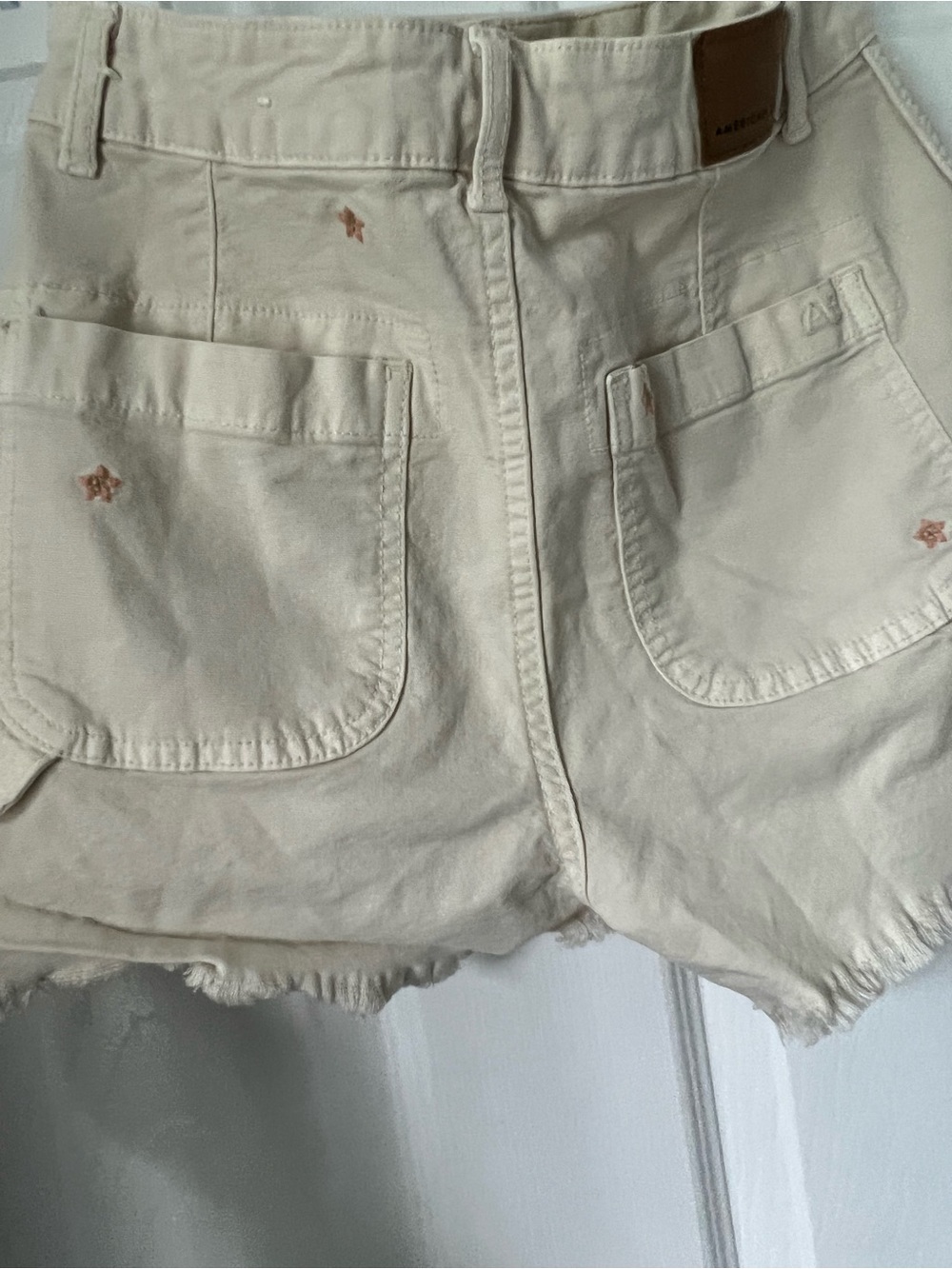 American Eagle Outfitters Beige Star Embroidered Frayed Hem Jean Shorts - Picture 2 of 7